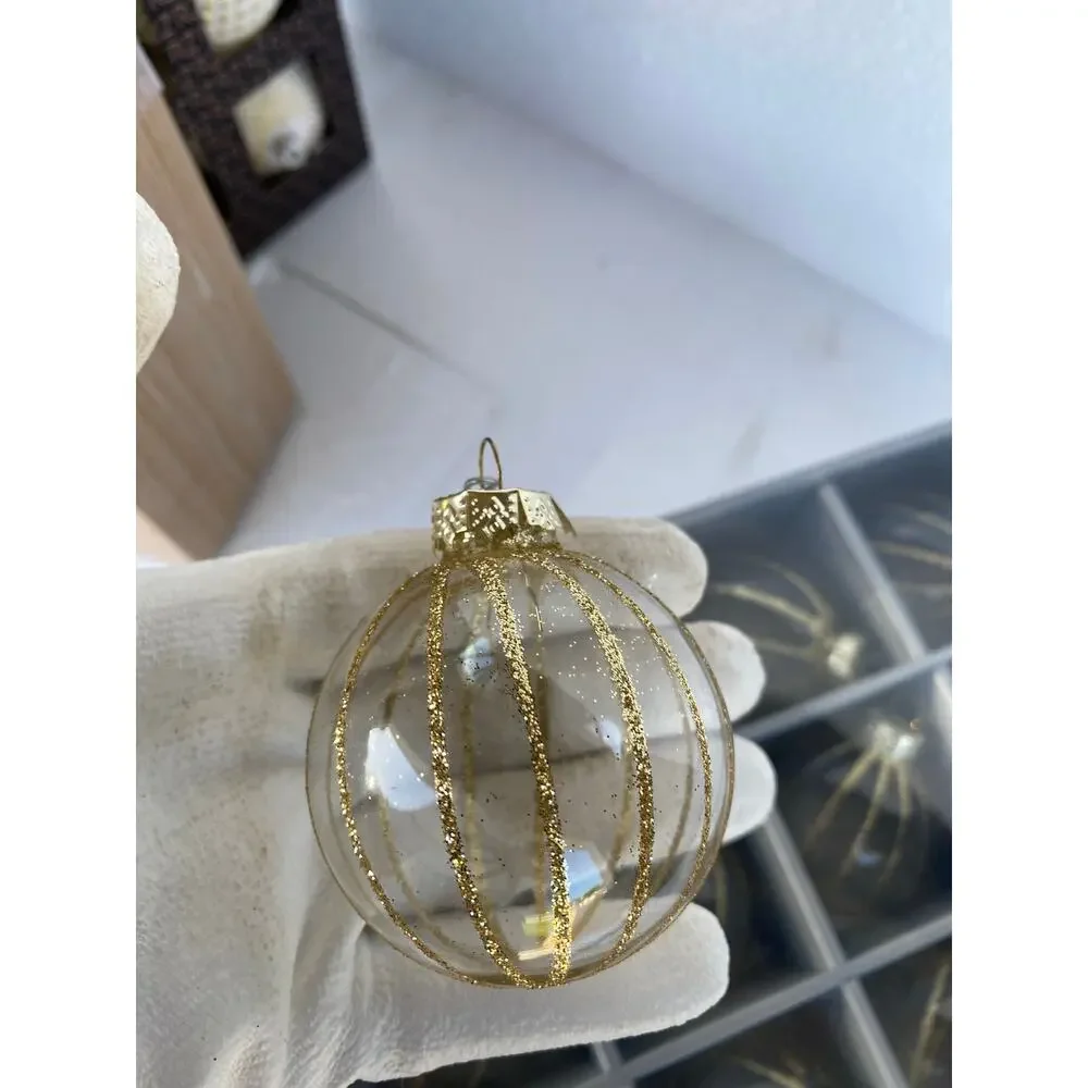 set of 12 glass Christmas ball ornaments featuring a dark tinted or smoked glass